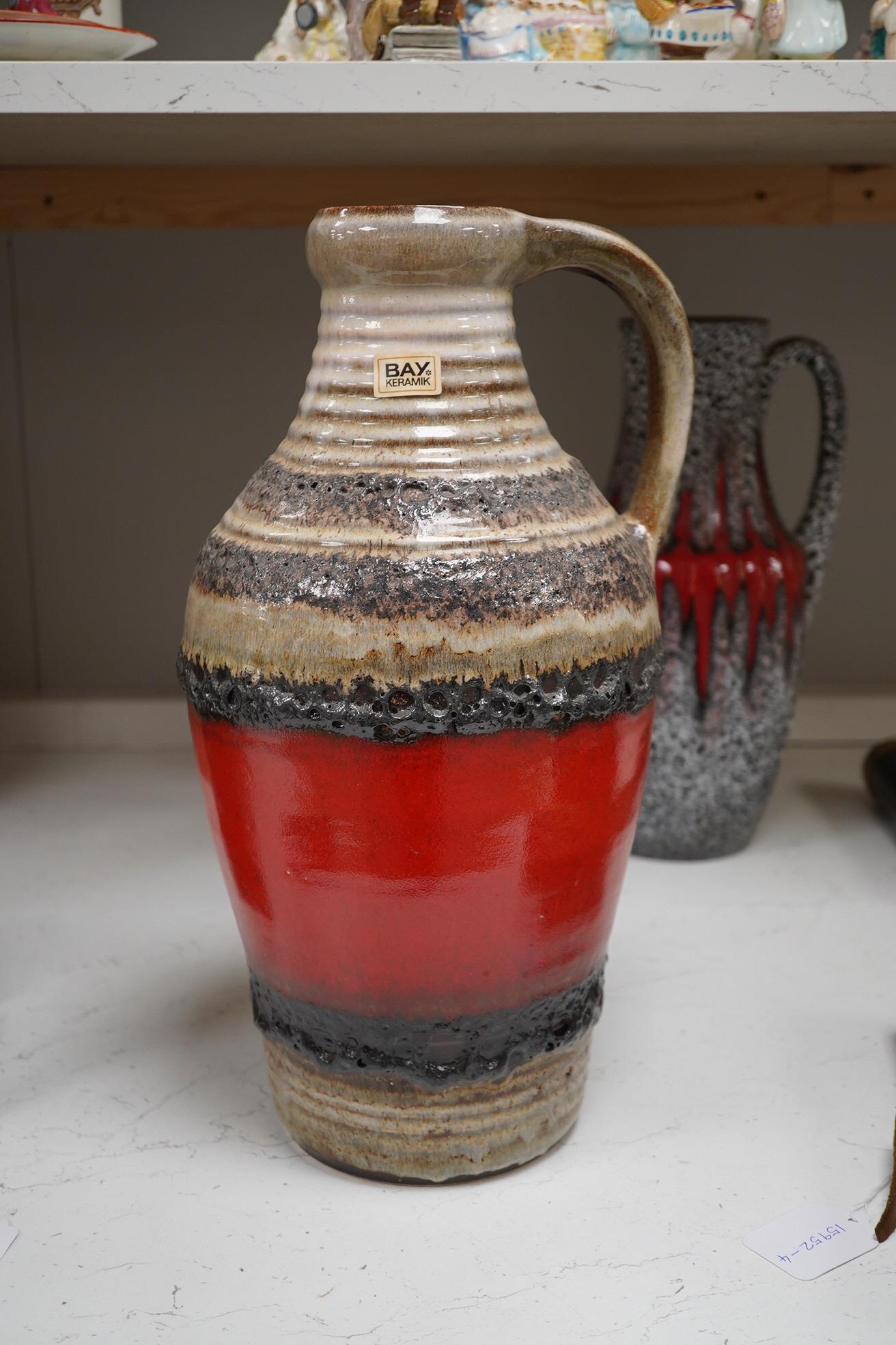 Three large West German vases including Bay and two volcanic glazed (fat lava), 42cm high. Condition - good